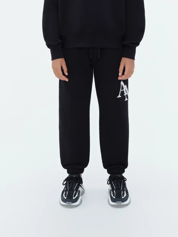 AMIRI Shorts & Sweatpants> STAGGERED SCRIBBLE SWEATPANT BLACK