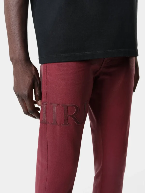 AMIRI Denim>SERIF LOGO WAX SKINNY JEAN Burgundy